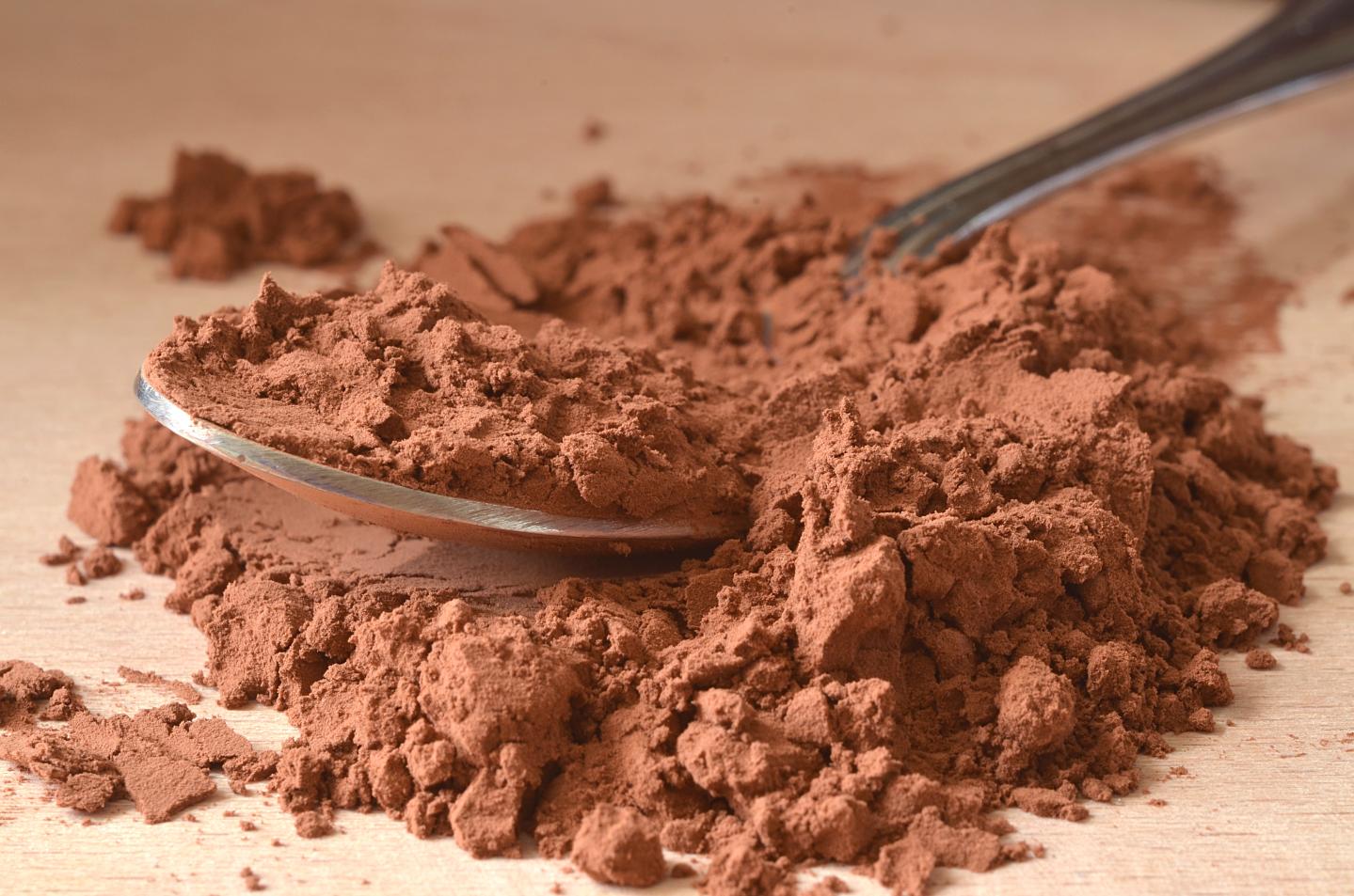 Spoon in brown powder