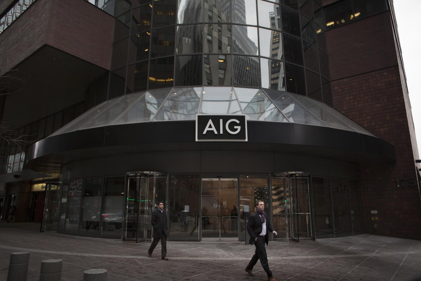 The American International Group Inc. Offices As Company Cut To Negative By S&P On Plan For Stake Sale, Payout