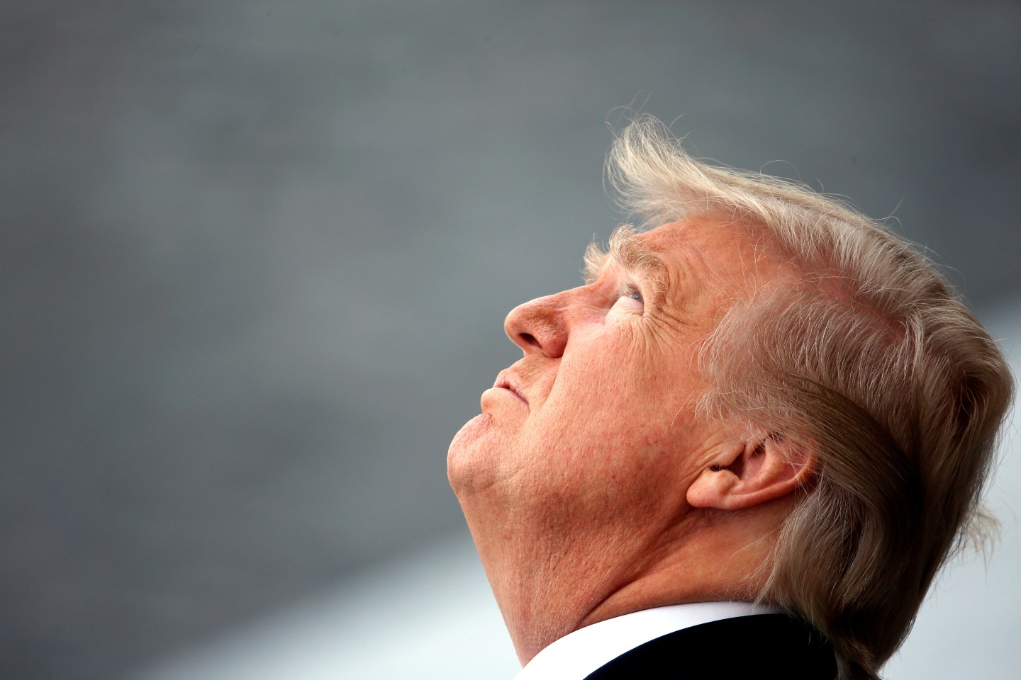 US President Donald Trump attends the traditional Bastille Day military parade on the Champs-Elysees in Paris
