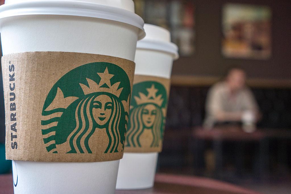 Coffee cups on the table in a Starbucks shop.  Last Thursday
