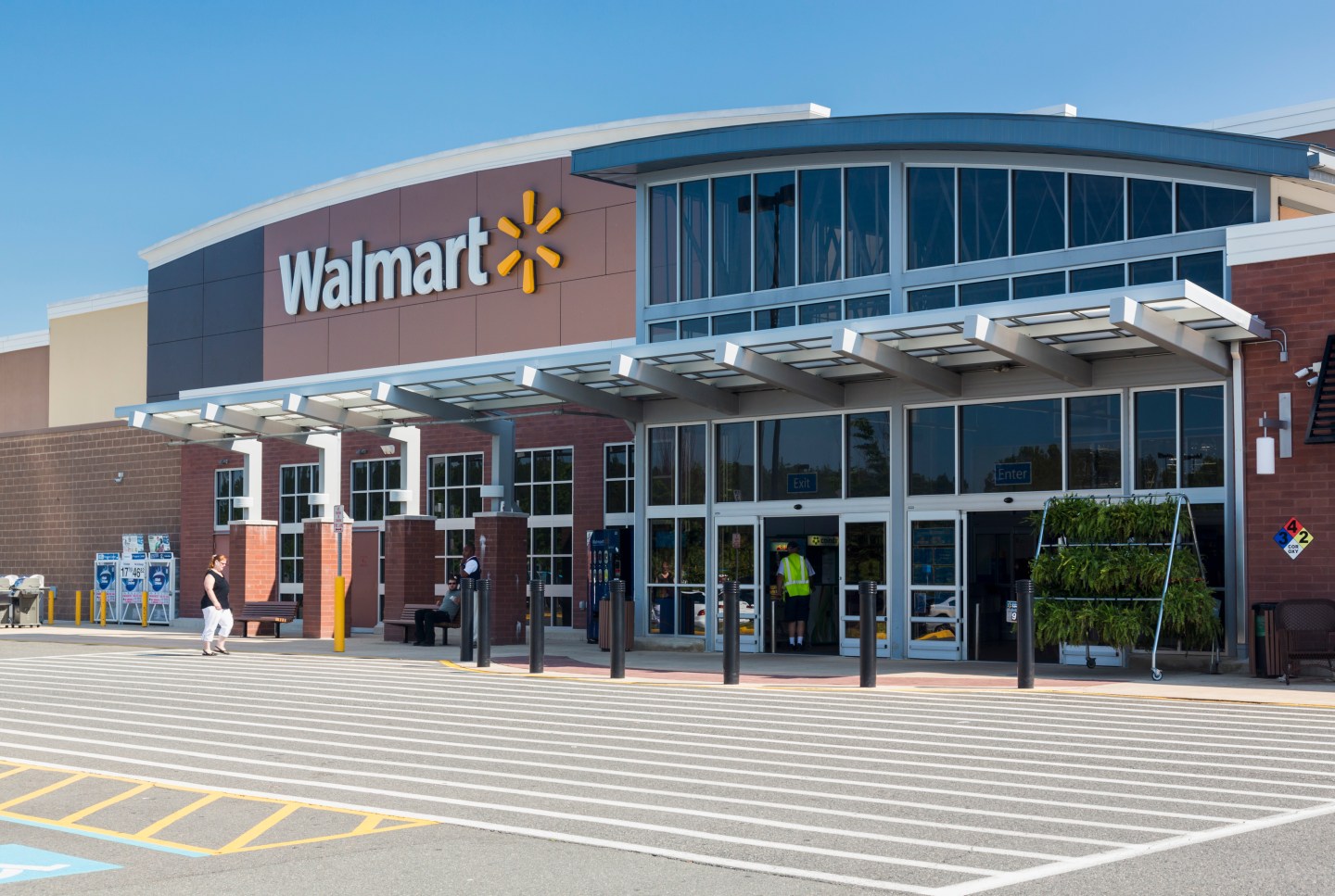 Entrance to large Walmart food supermarket or superstore in Haymarket, Virginia, USA