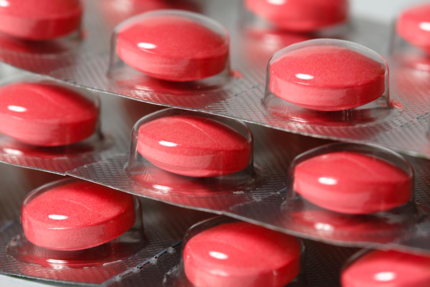 Close up of blister packs red pills