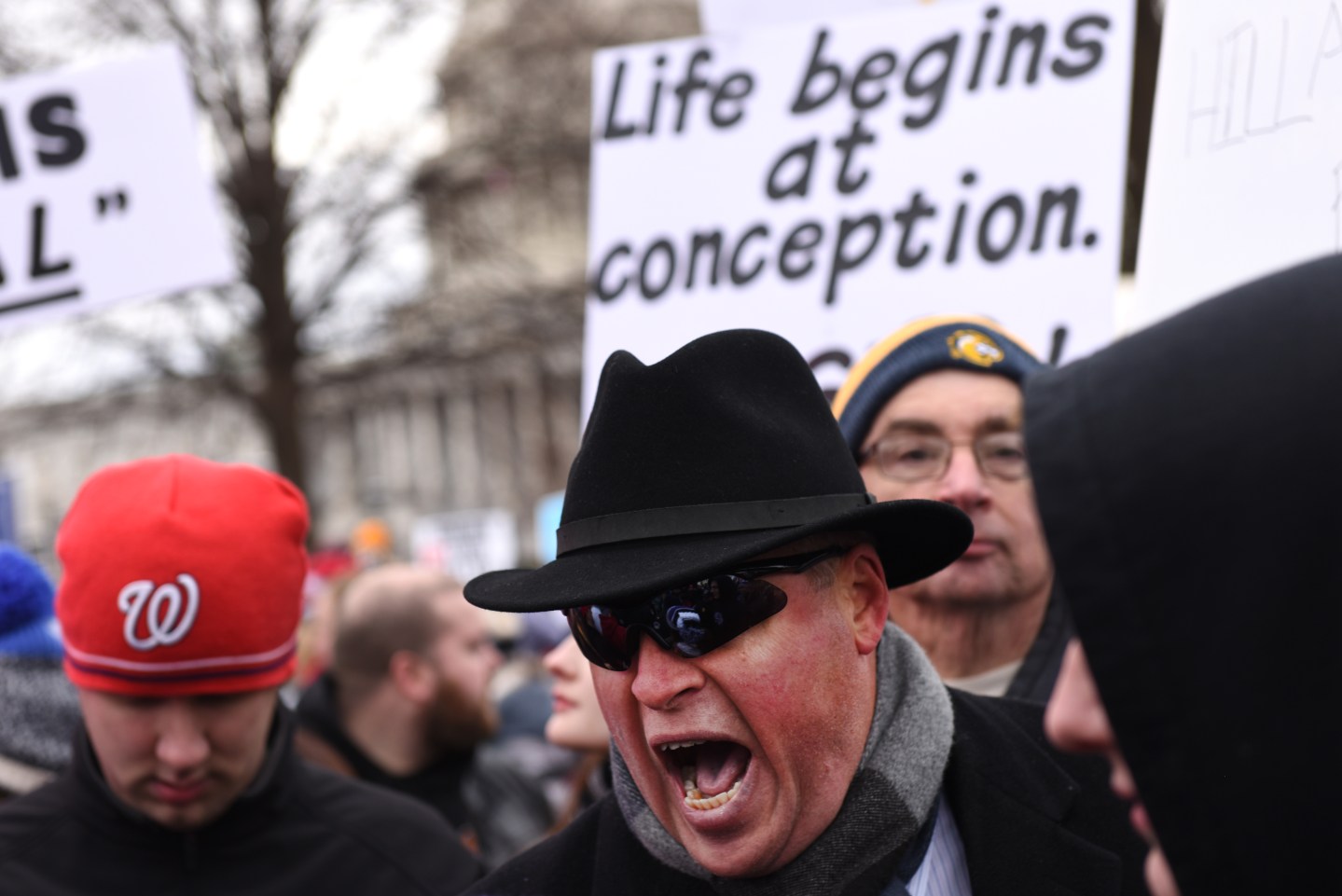 WASHINGTON DC - JANUARY 27: An abortion opponent yells at a pro