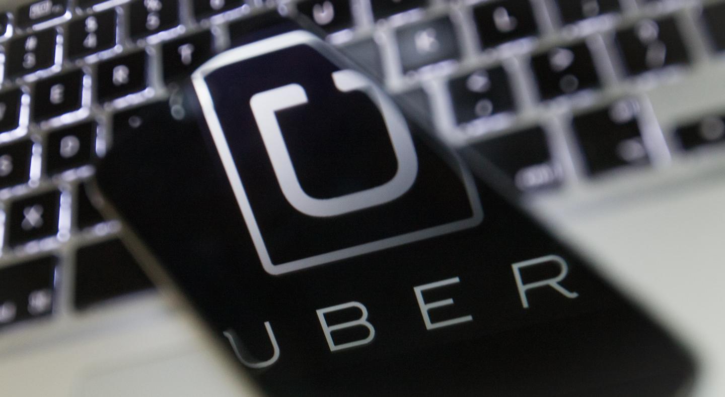 Uber logo reflection.