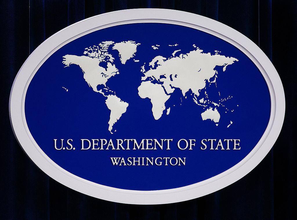 The US Department of State logo is displ