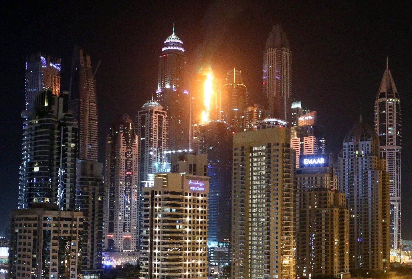 The Torch Tower Residence block is pictured on fire in Dubai Marina on August 4, 2017 in Dubai, United Arab Emirates.