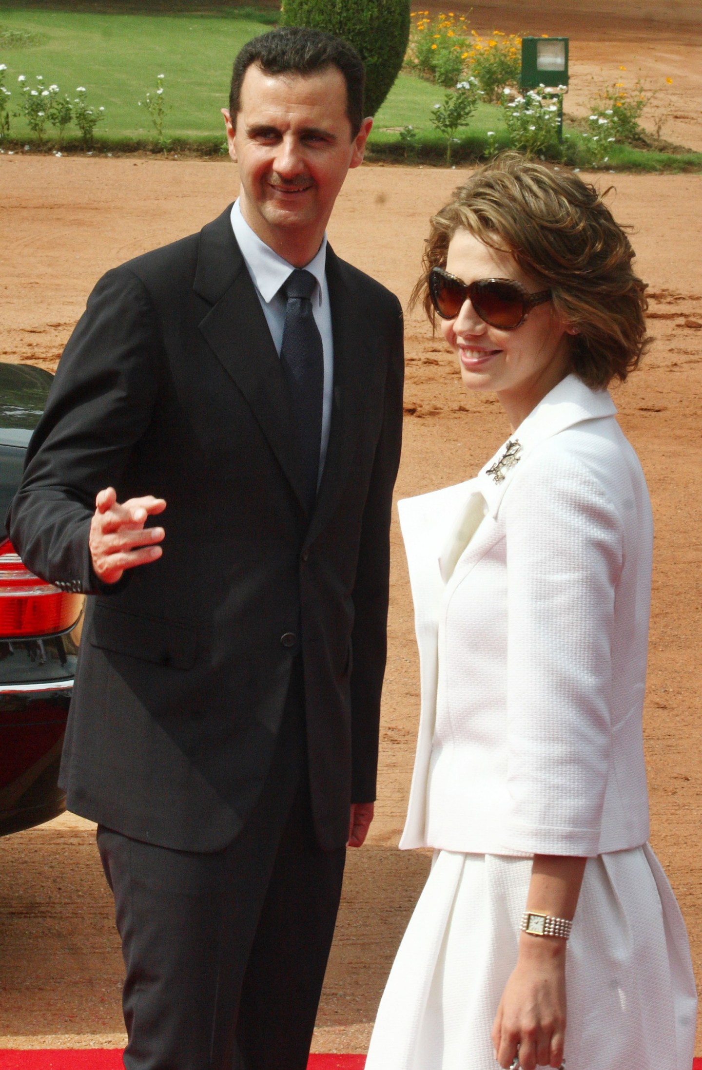 Bashar al- Assad, president of Syria and his wife Asma al-Assad arrives at a welcoming ceremony at the Presidential Palace in New Delhi, India, on Wednesday, June 18, 2008. Photographer: Pankaj Nangia/Bloomberg News