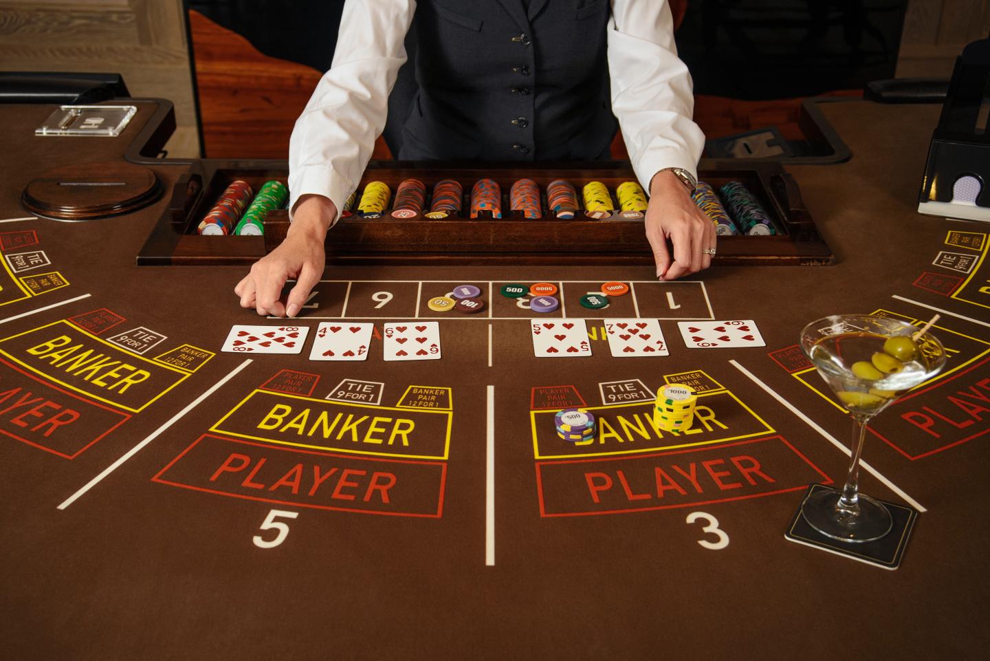 Dealer at baccarat table