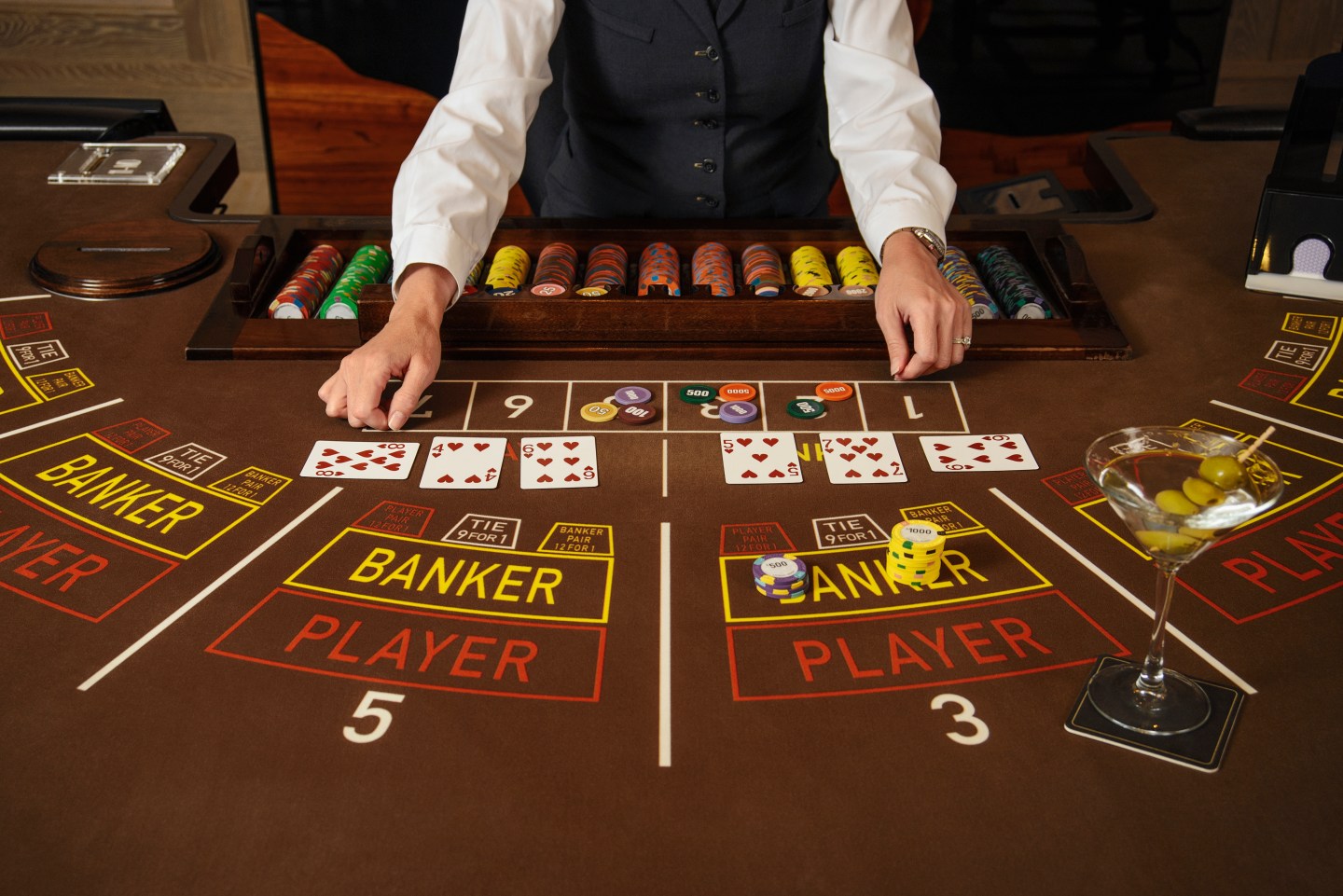 Dealer at baccarat table