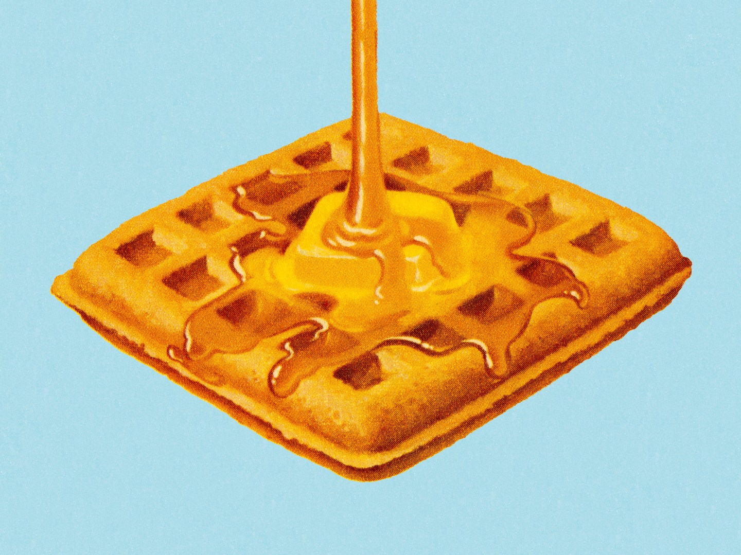 Syrup Being Poured on Waffle