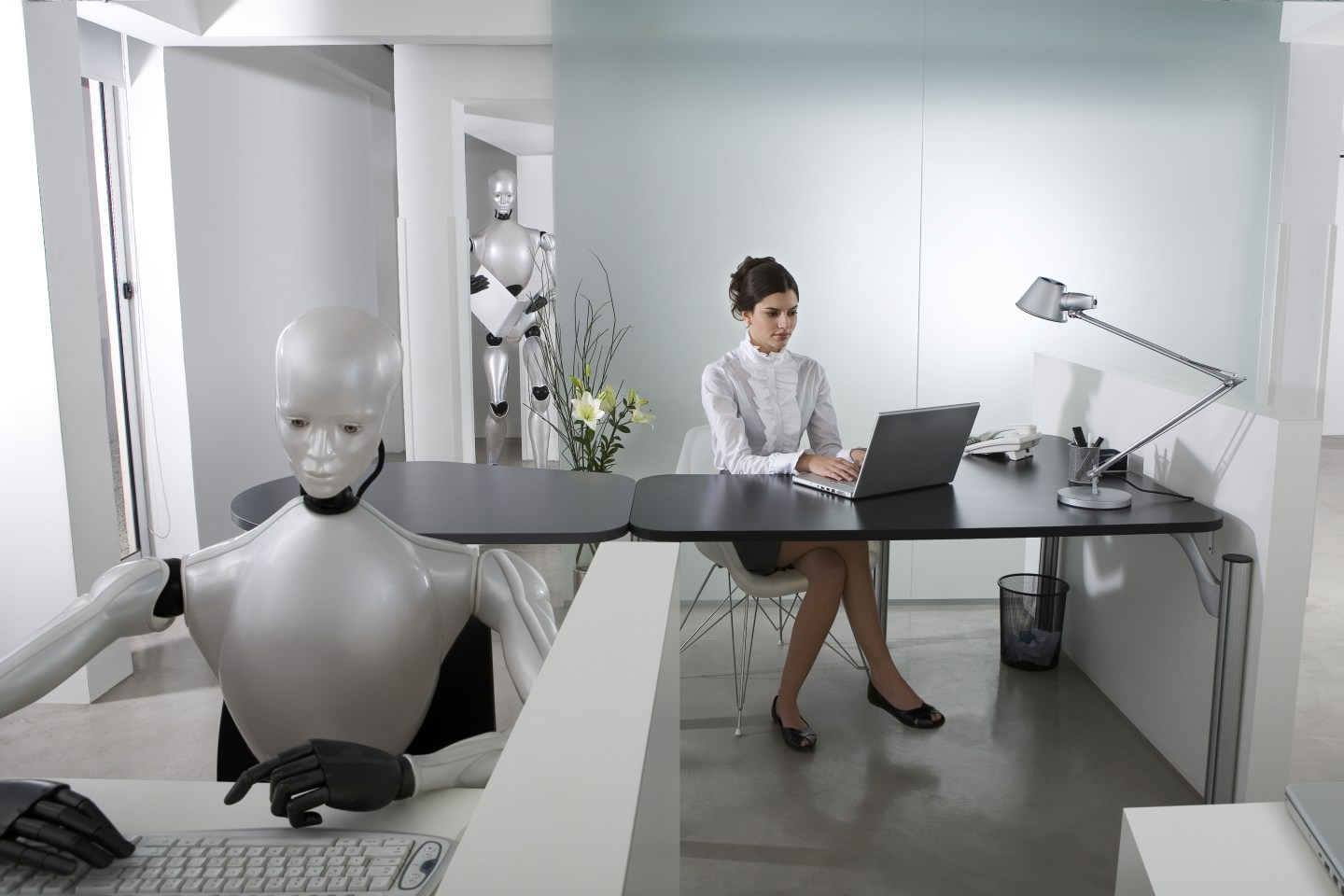 Businesswoman and Robots working at office