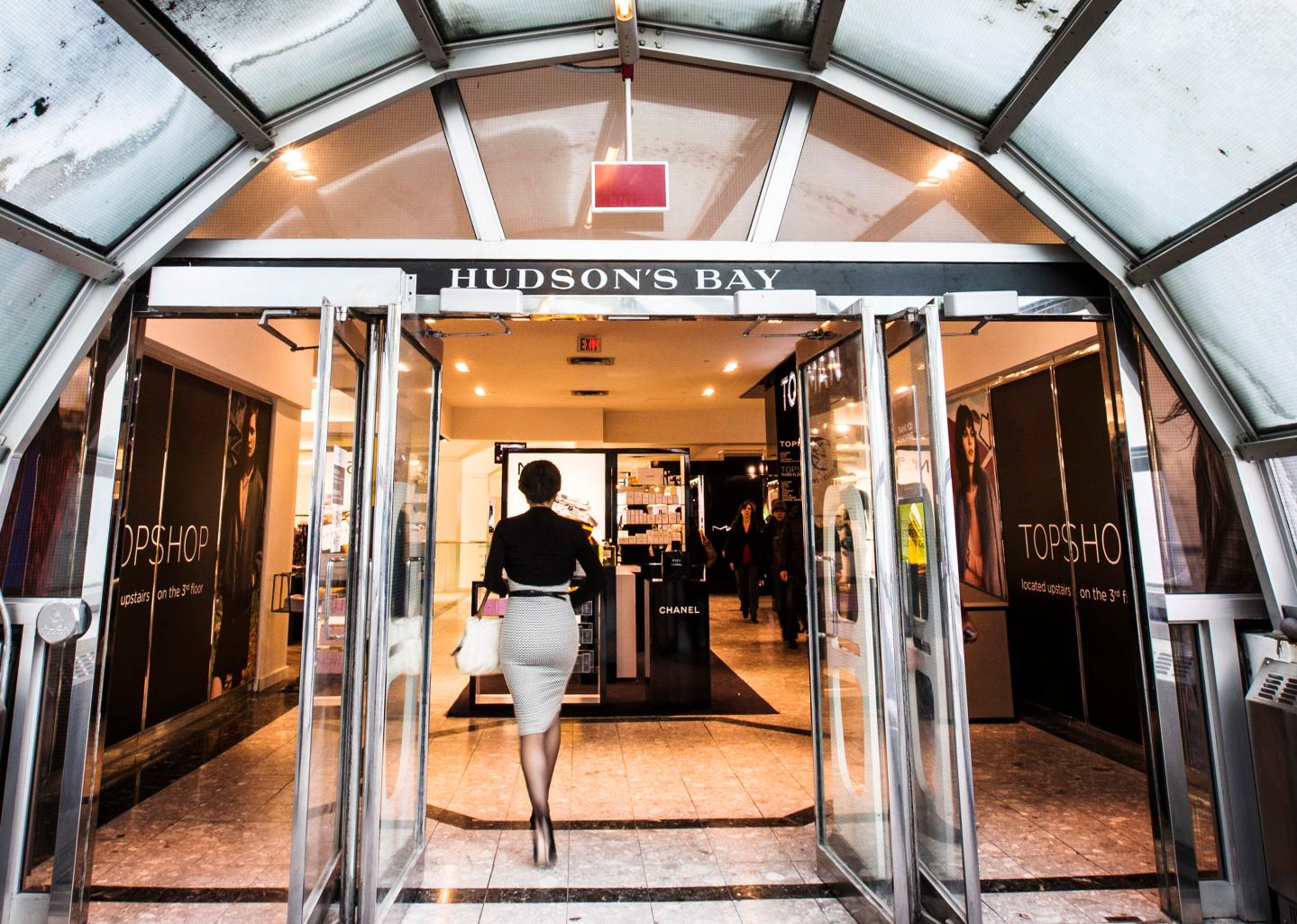 A man walks through the doors at the Hudson's Bay Company (HBC) flagship department store in Toronto