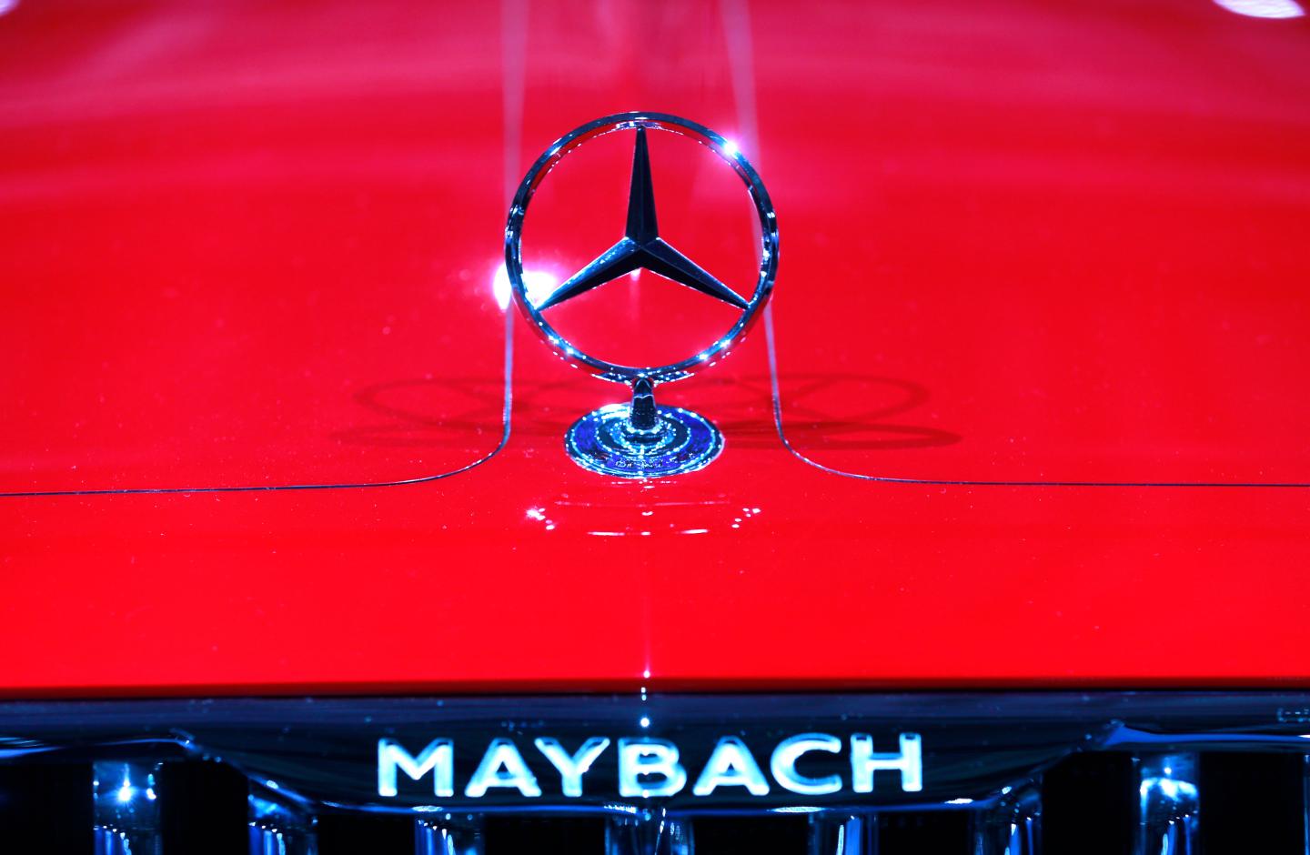 A Mercedes sign is seen on the Mercedes Maybach 6 car before the Daimler annual shareholder meeting in Berlin