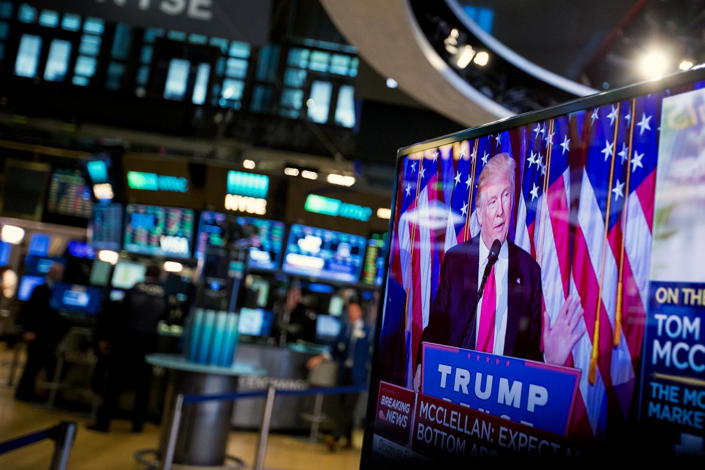 U.S. President-elect Donald Trump is seen speaking on a television on the floor of the New York Stock Exchange (NYSE) in New York, U.S., on Wednesday, Nov. 9, 2016.