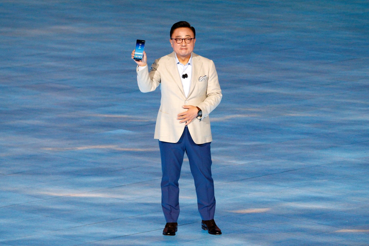 Koh Dong-jin, president of Samsung Electronics' Mobile Communications holds the Galaxy Note 8 smartphone during a launch event in New York City