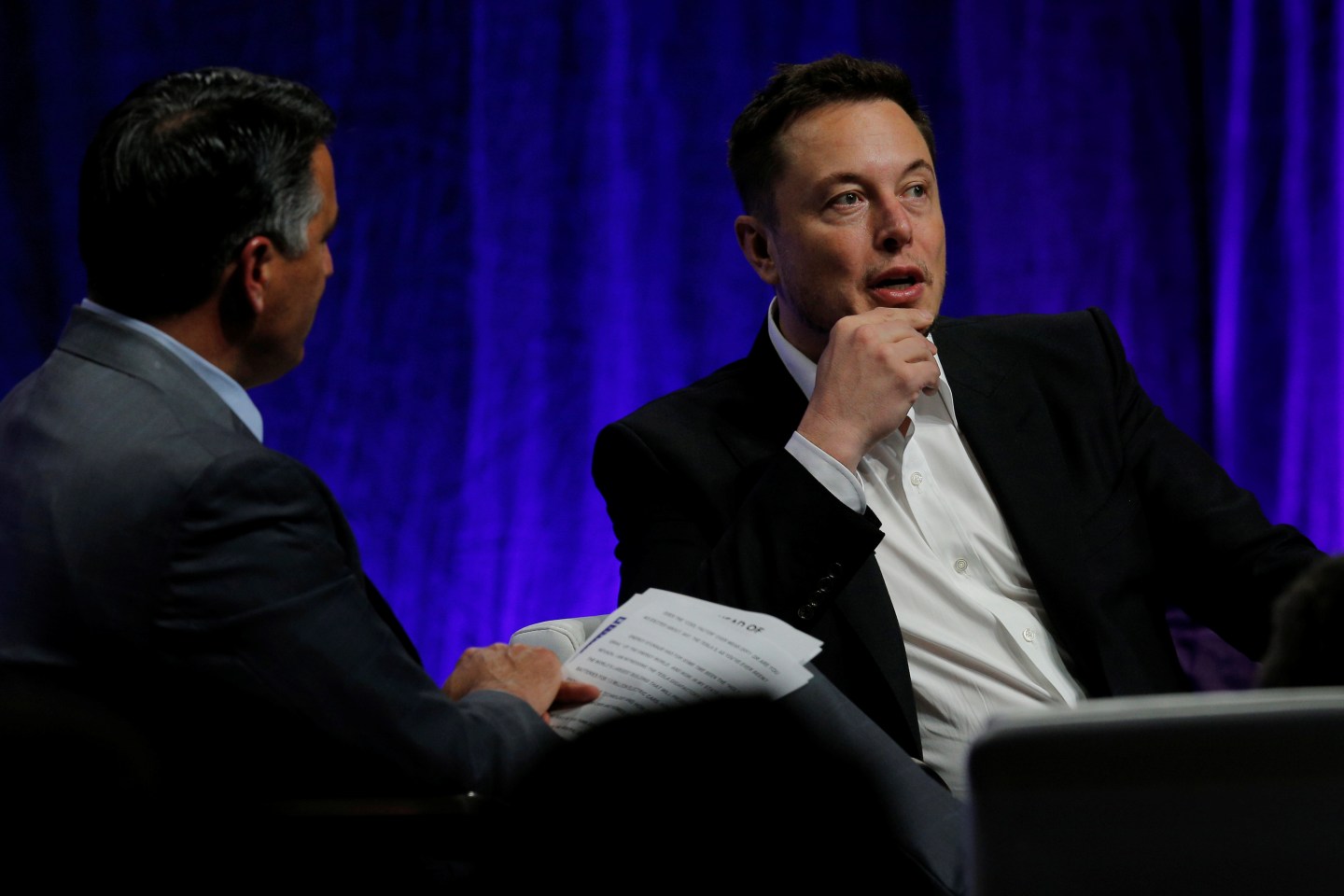Tesla Motors CEO Elon Musk answers questions from Nevada Governor Brian Sandoval during the National Governors Association Summer Meeting in Providence