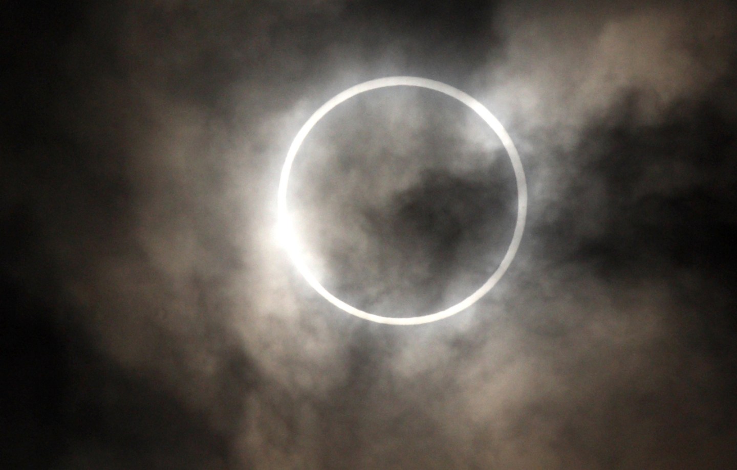 Morning Commuters Observe Solar Eclipse