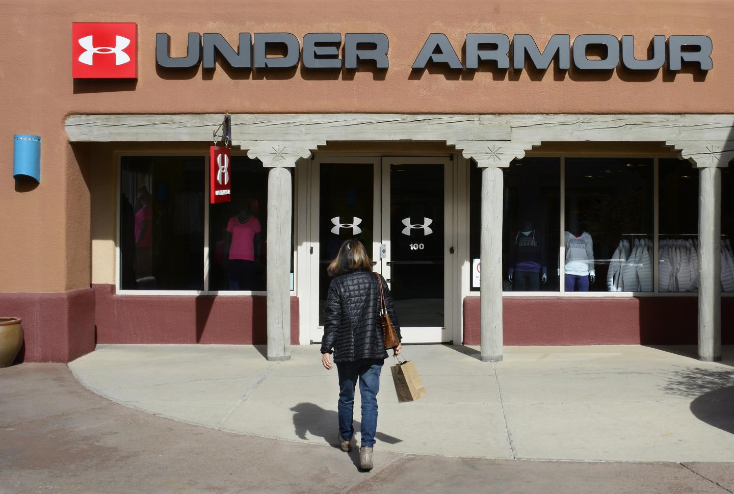 A shopper enters an Under Armour factory outlet store in Santa Fe, New Mexico, in February 2017.