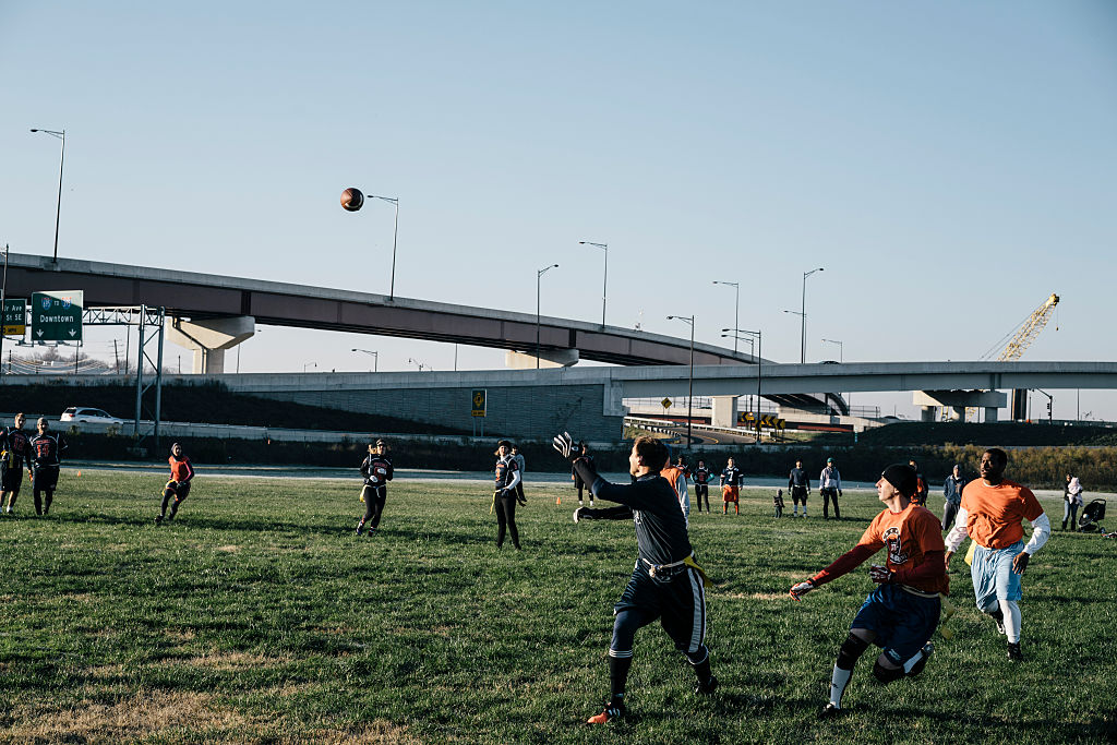 WASHINGTON, DC - NOV 23 Players take the field on the Capitol Alumni Network flag football league at Anacostia Park near the 11th Street Bridge on Dec. 05, 2015. (Photo by Greg Kahn/GRAIN for The Washington Post)
