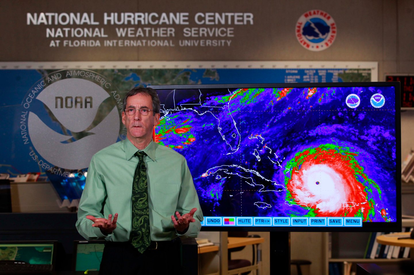 MIAMI, FL-  SEPTEMBER 7: The National Hurricane Center's Acting Director Dr. Ed Rappaport is seen during a televised interview at the National Weather Service's facility in Miami September 7, 2017 where they track and predict Hurricane Irma's advance