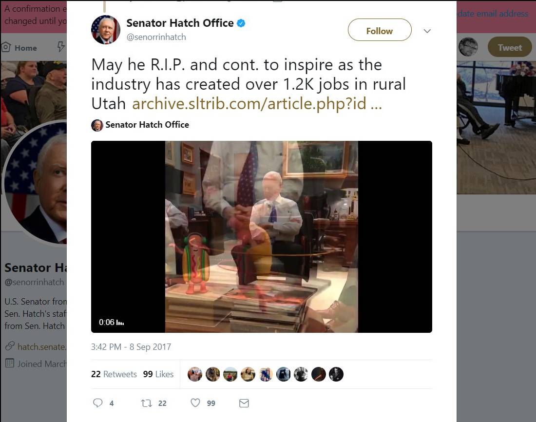 Senator Orrin Hatch watches a hot dog dance.