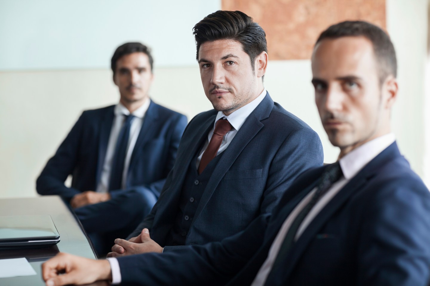 Portrait of businessmen in office conference room