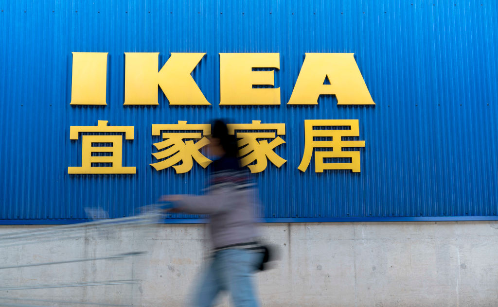 TIANJIN, CHINA - 2017/04/12: A customer pushes a shopping cart passing by the IKEA's logo.  IKEA's global profits rose by 20% in 2016 as it made gains in the Chinese market. (Photo by Zhang Peng/LightRocket via Getty Images)