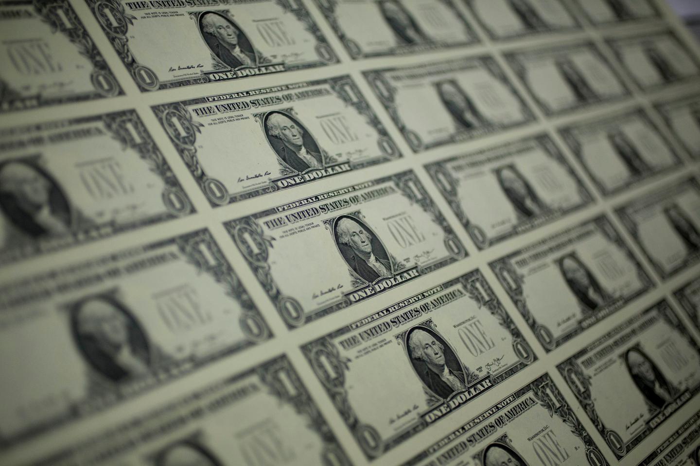 Operations At The Bureau Of Engraving And Printing As The $1 Bill Is Printed