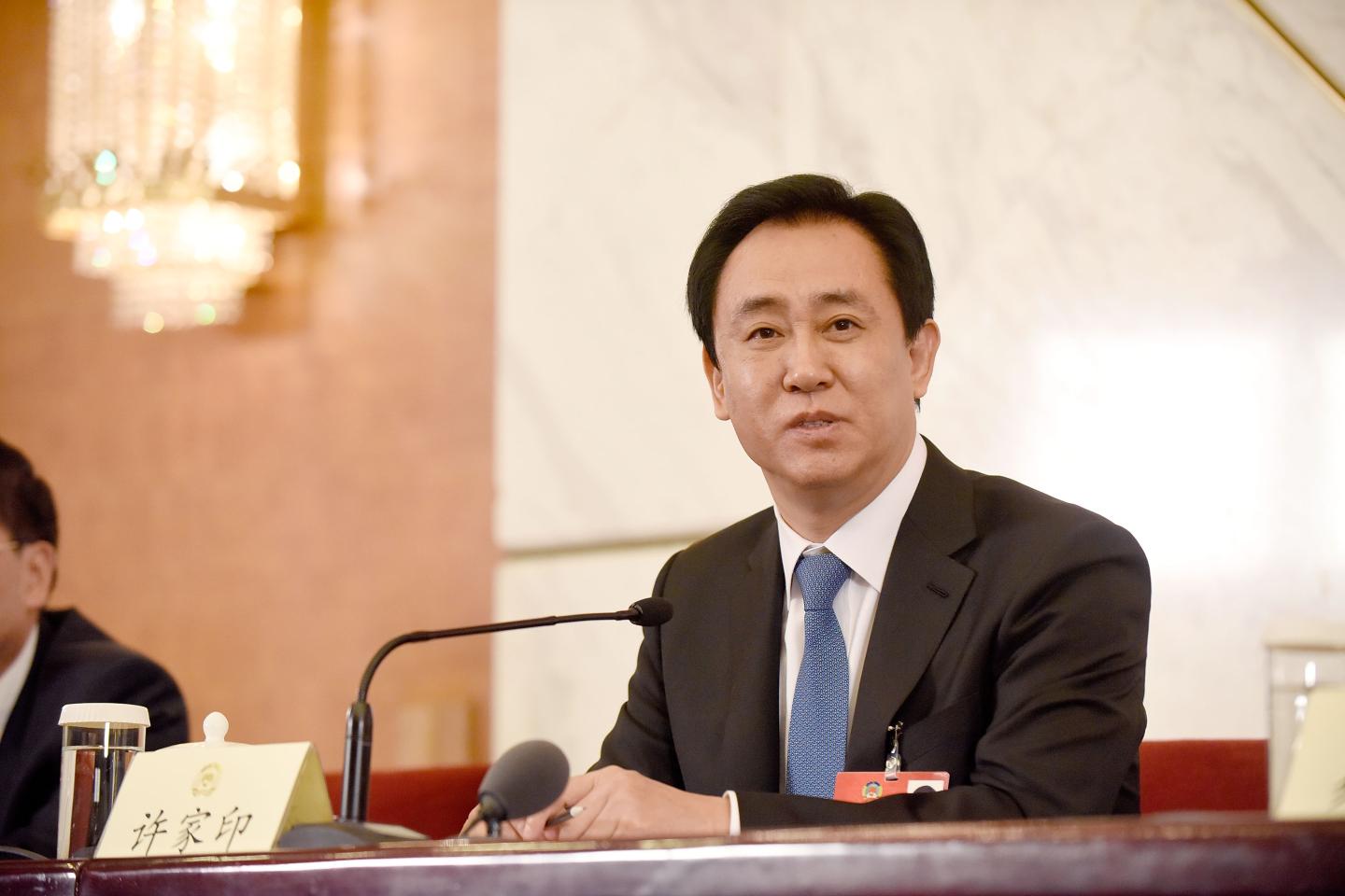 Xu Jiayin, Standing Committee Member of the 12th CPPCC National Committee and Chairman of the Board of EVERGRANDE Group speaks during a news conference on the sidelines of the fourth session of the 12th National People's Congress, on March 6, 2016 in Beijing, China.