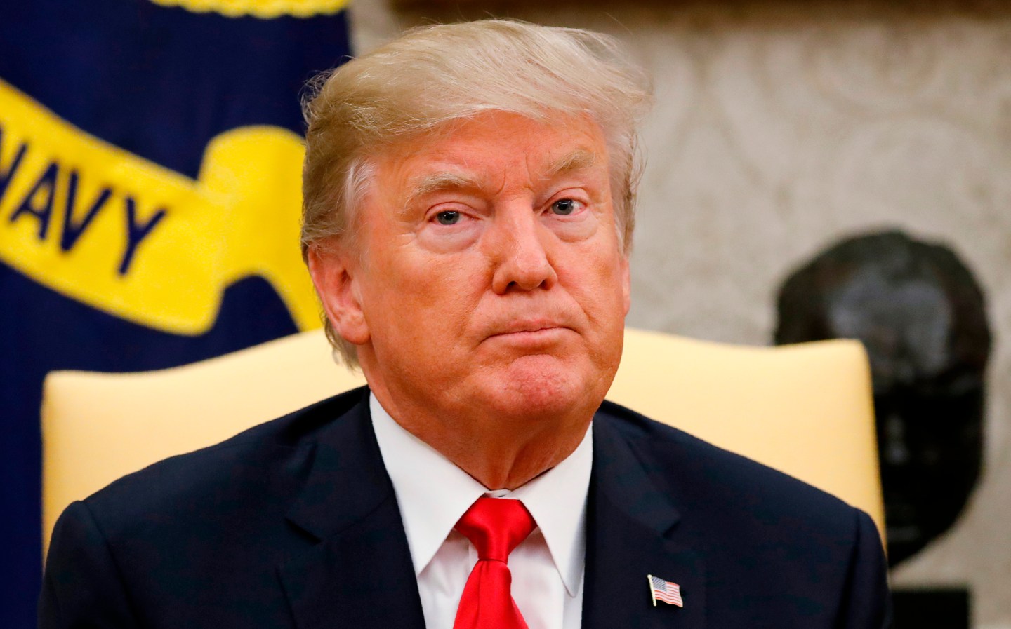 U.S. President Trump listens to a question as he meets with Canada's Prime Minister Trudeau in the Oval Office at the White House in Washington