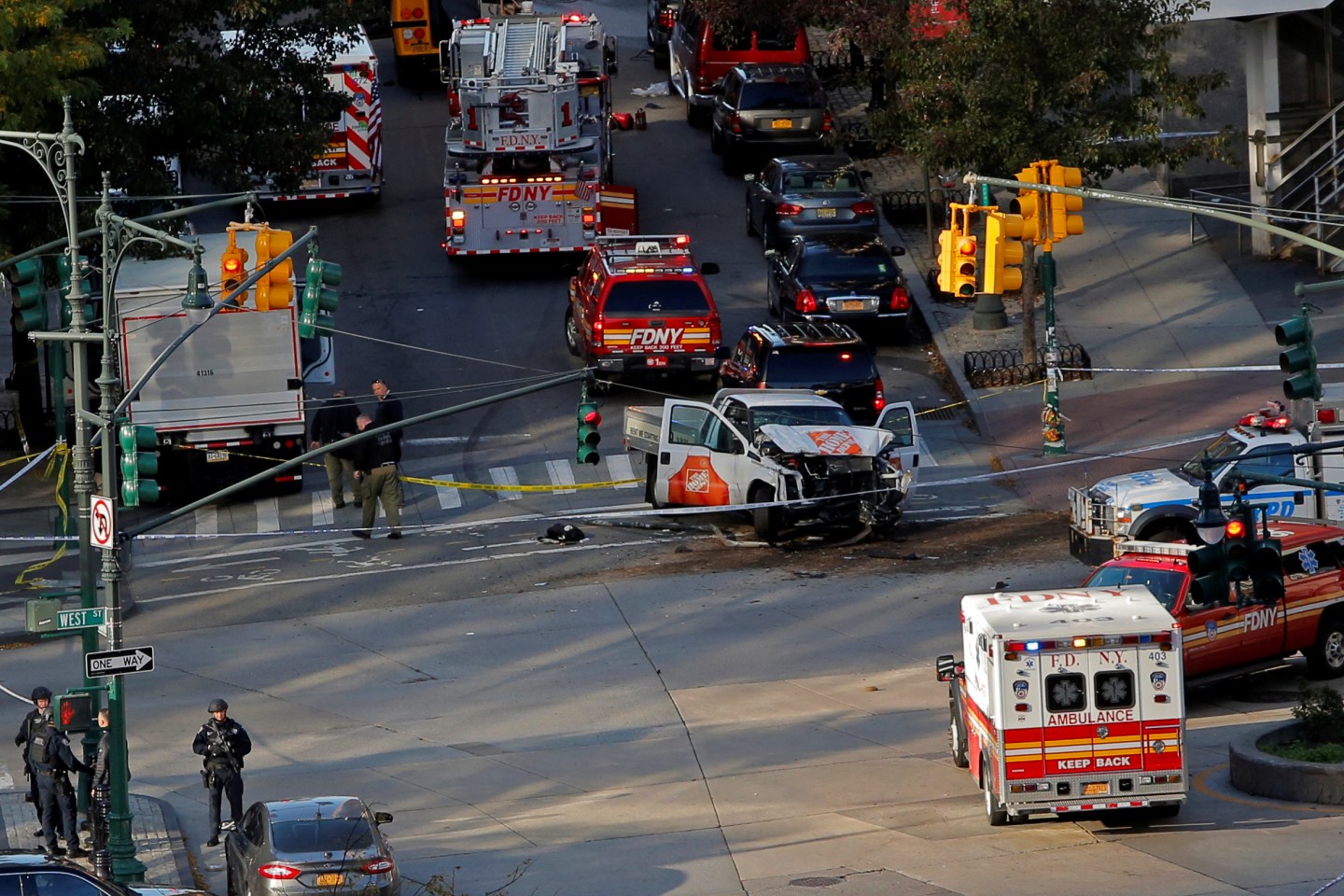 Emergency crews attend the scene of an alleged shooting incident on West Street in Manhattan, New York.