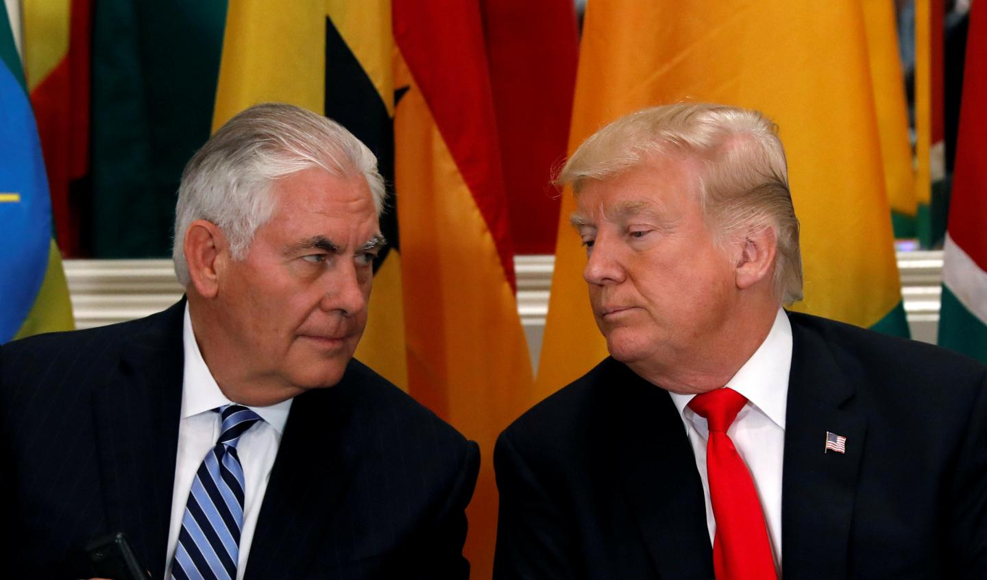 FILE PHOTO: U.S. President Donald Trump and Secretary of State Rex Tillerson confer during a working lunch in New York