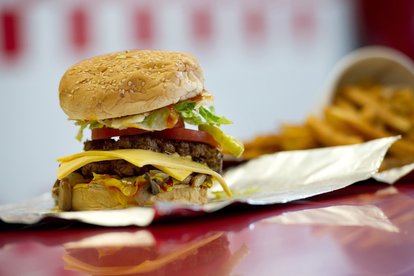 A cheeseburger is arranged for a photograph at a Five Guys Inc. restaurant in Dublin, CA.