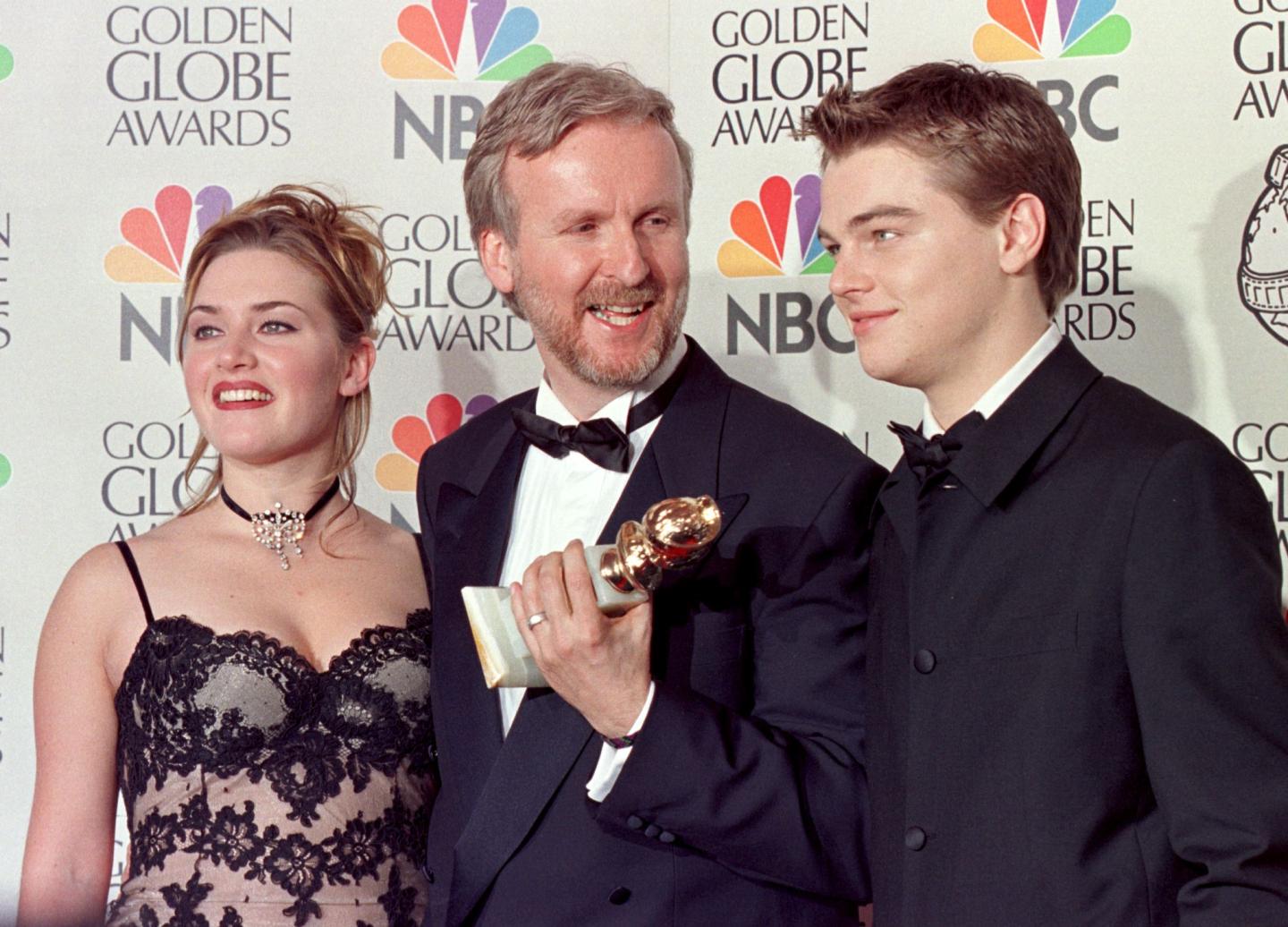 Director James Cameron(C) and actress Kate Winslet
