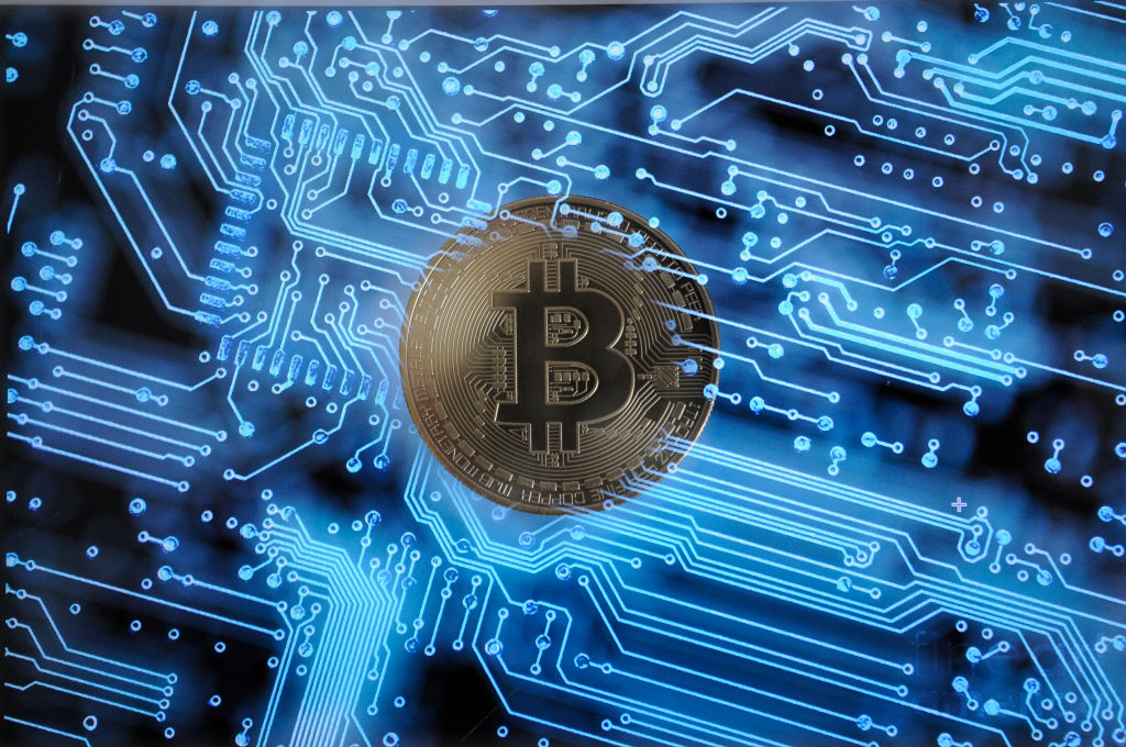Bitcoin to split to deal with rising transaction costs