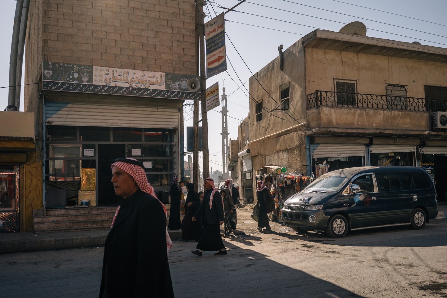 TAL ABYAD, SYRIA, NOV 26: Local Arabs walk on the streets of Ta