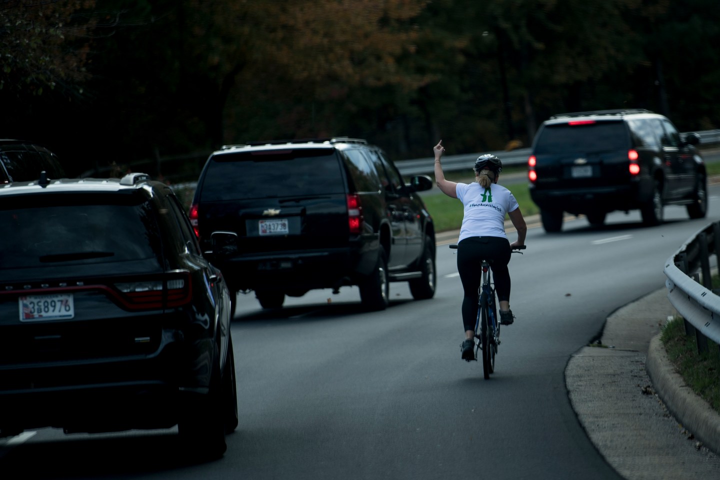 Woman Flipping Trump Off