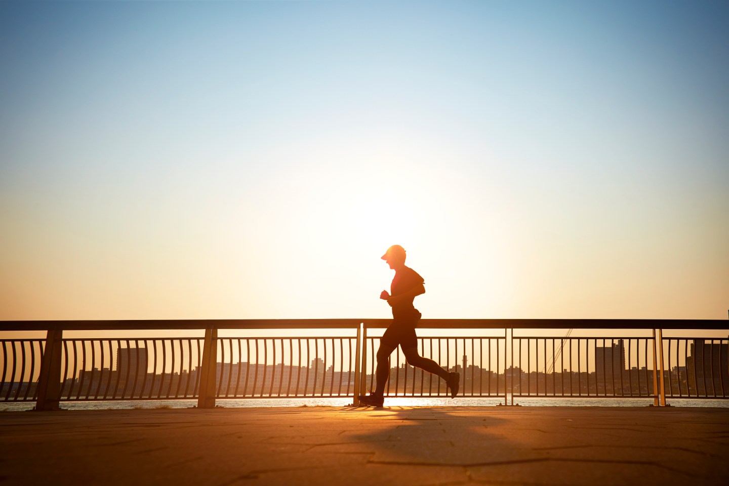 Man enjoying an early morning jog in the city.
