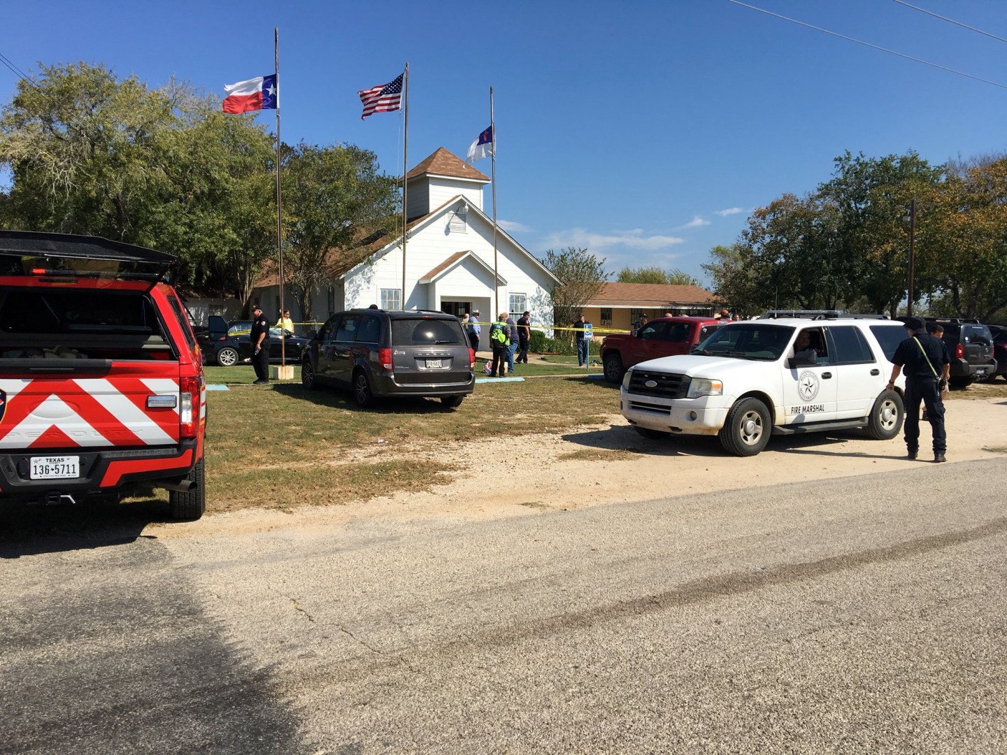 The area around a site of a mass shooting is taped out in Sutherland Springs