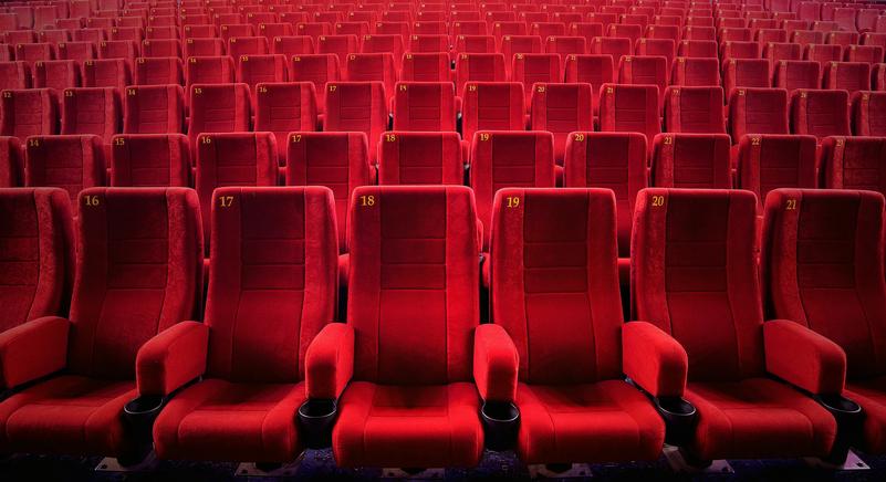 Red Empty Seats At Movie Theater