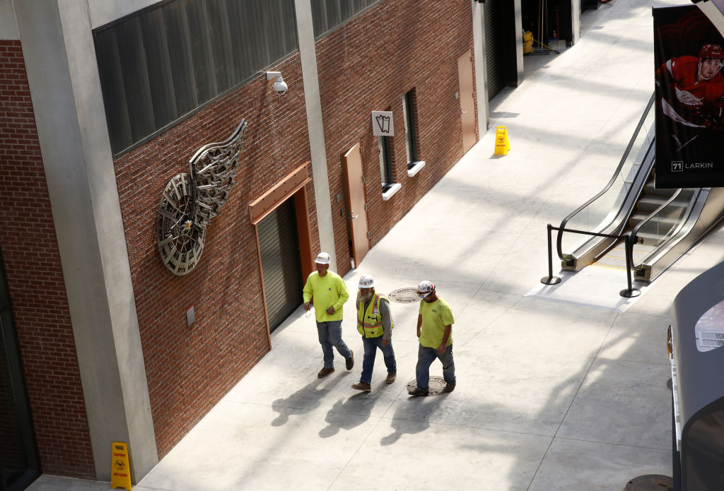 Workers at Little Ceasar's Arena in Detroit