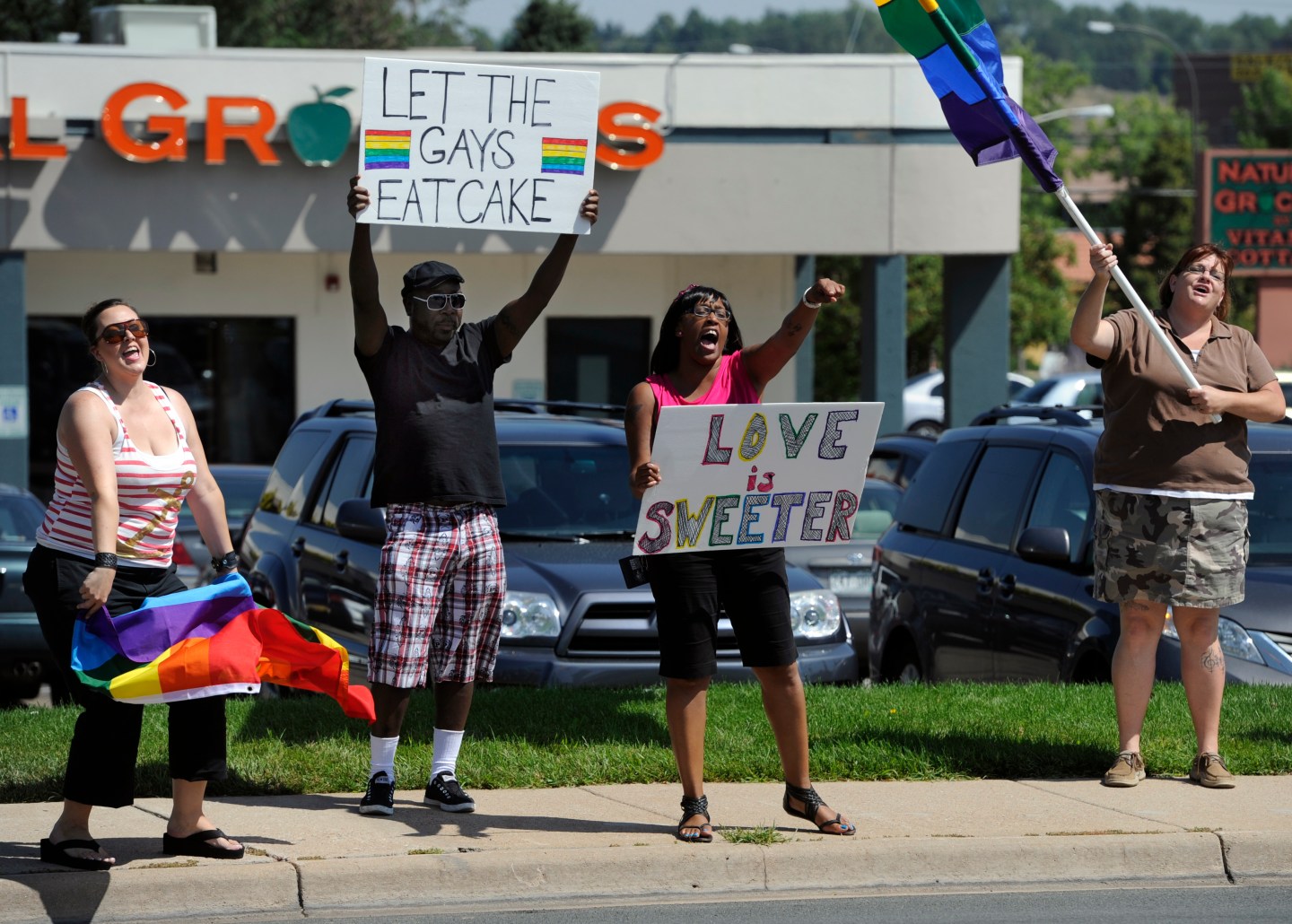 Dave Mullins and Charlie Craig protest gay wedding cake denial