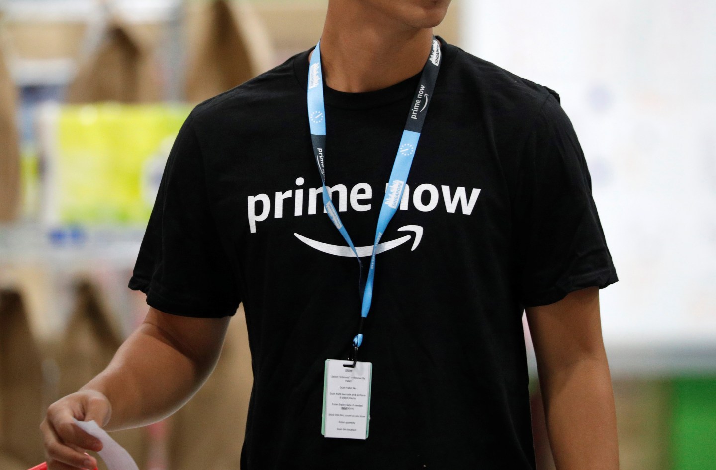 An employee works at Amazon's Prime Now fulfillment centre in Singapore