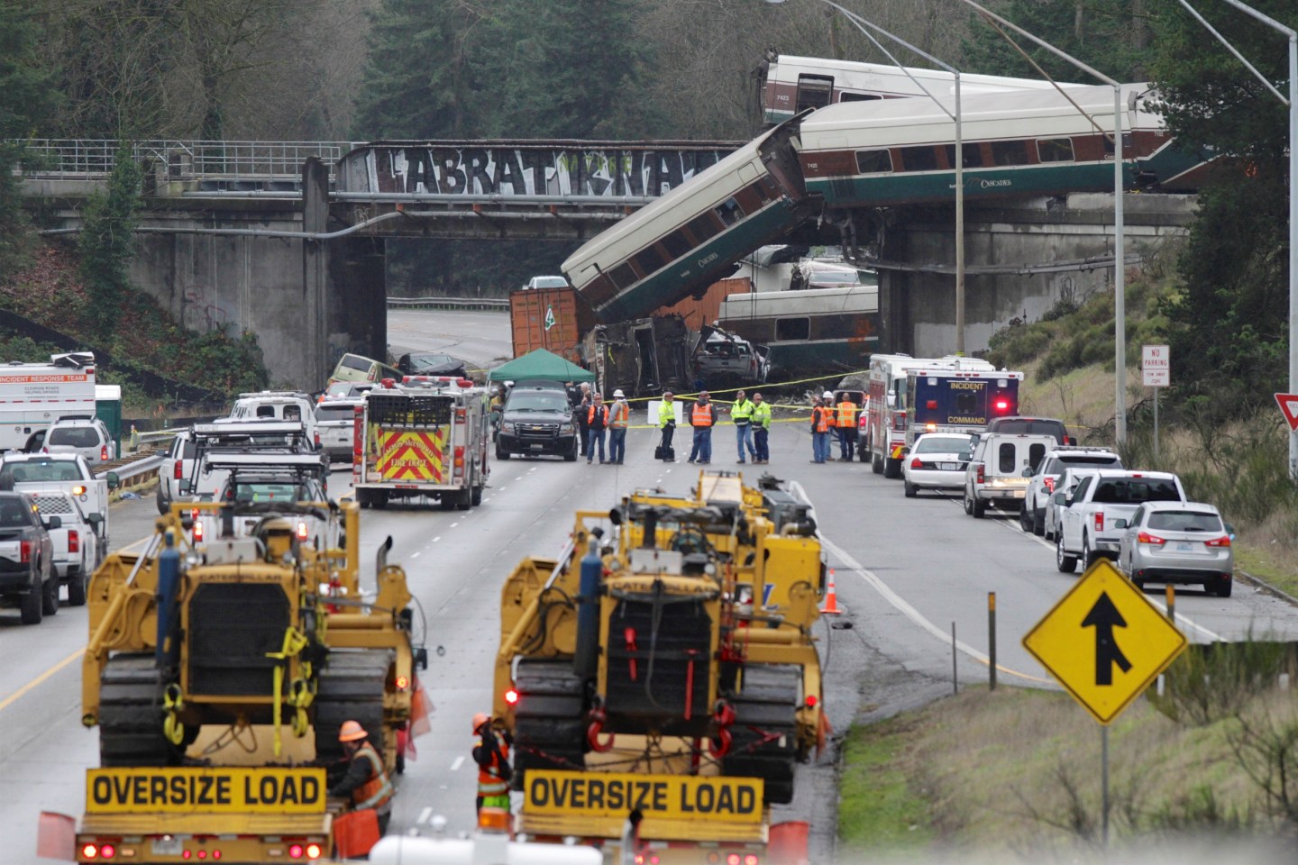 FILE PHOTO: Rescue personnel and equipment are seen at the scene where an Amtrak passenger train derailed in DuPont
