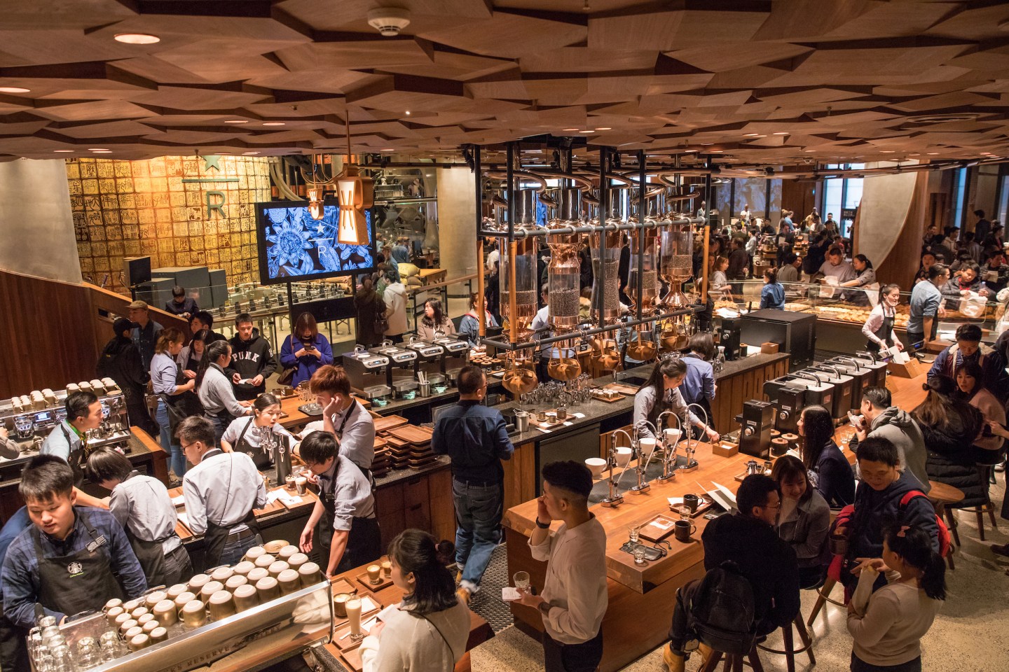 Guests explore the new Starbucks Roastery in Shanghai, China on Sunday, December 3, 2017. (Joshua Trujillo, Starbucks)