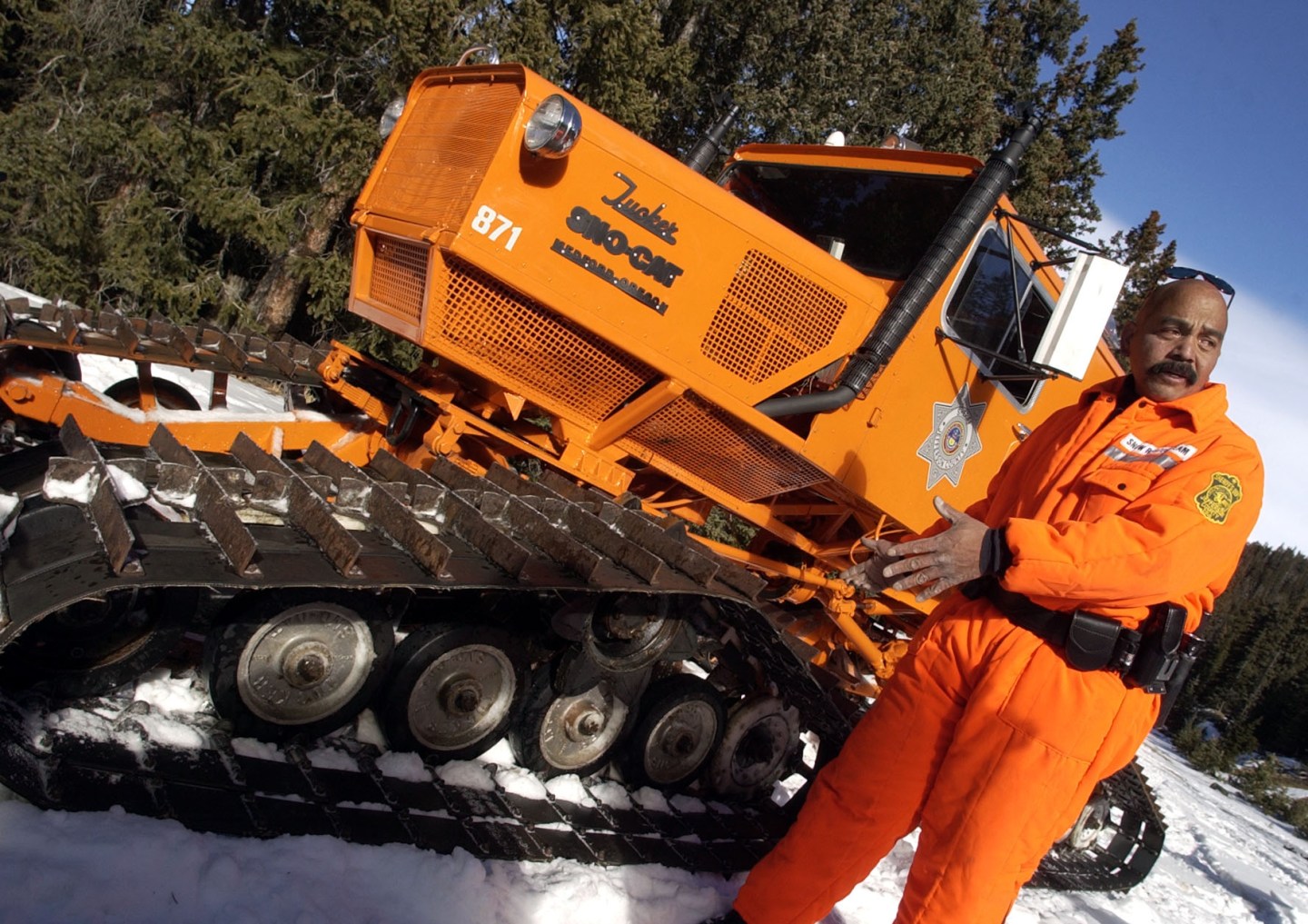 EVERGREEN, CO, DECEMBER 1, 2003 - Deputy Mike Sensano drives the Jefferson County Sheriff's 12-person Sno-Cat at Squaw Pass on Monday. The office has bought the Sno-Cat (the old one seated 4 people) for a fraction of the usual price. ($40,000) During last