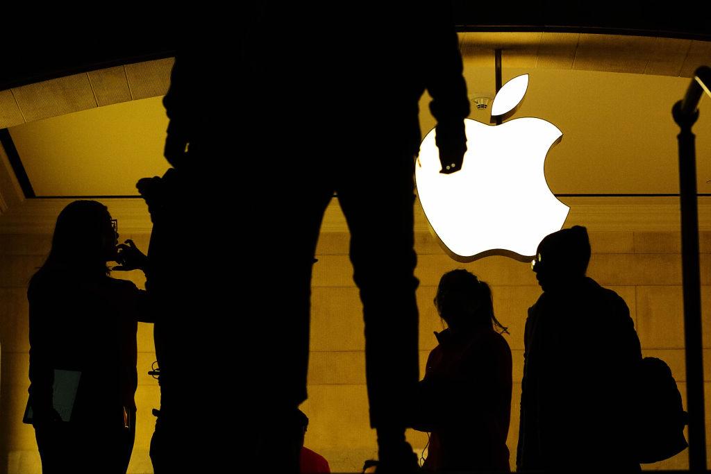 People outside an Apple Store.