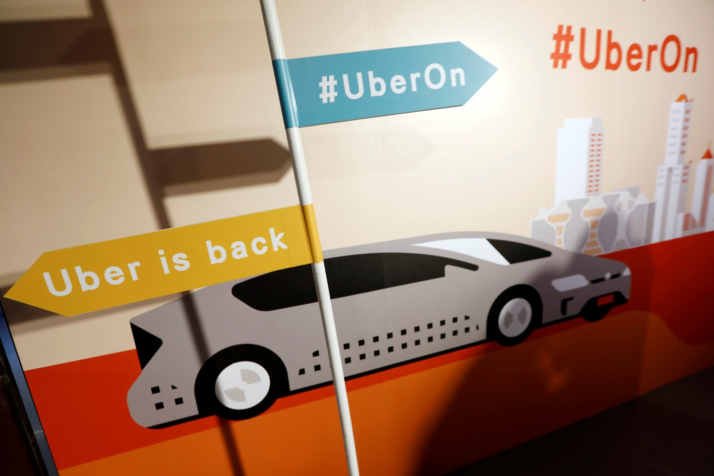 A sign is seen during a news conference to announce Uber resumes ride-hailing service, in Taipei