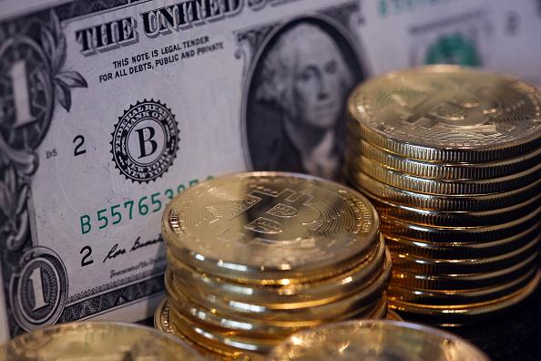Bitcoins And U.S. Dollar Notes As IMF Vouches For Virtual Currencies