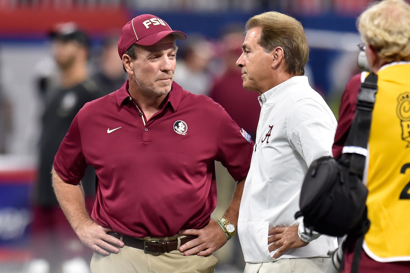Head coach Nick Saban of the Alabama Crimson Tide speaks with head coach Jimbo Fisher of the Florida State Seminoles prior to their game at Mercedes-Benz Stadium on September 2, 2017 in Atlanta, Georgia.